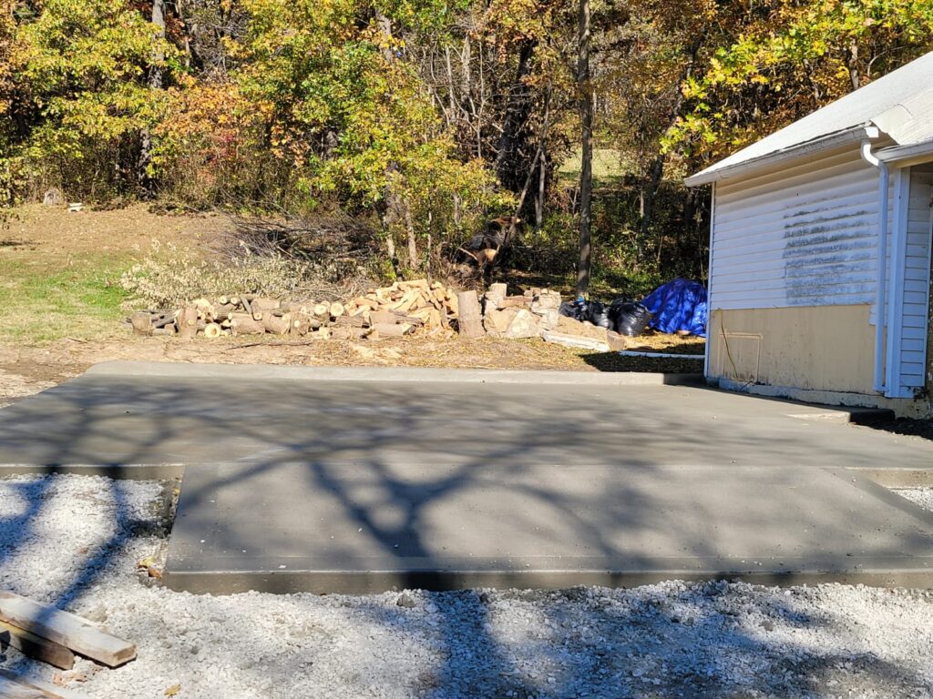 Discover the durability and functionality of a smooth concrete garage floor, perfect for a future garage. This project features a clean, polished finish without any stamp design or color. Learn more about how you can customize your concrete projects with coloring and stamped designs. Contact Eagle Stone Concrete for more information.