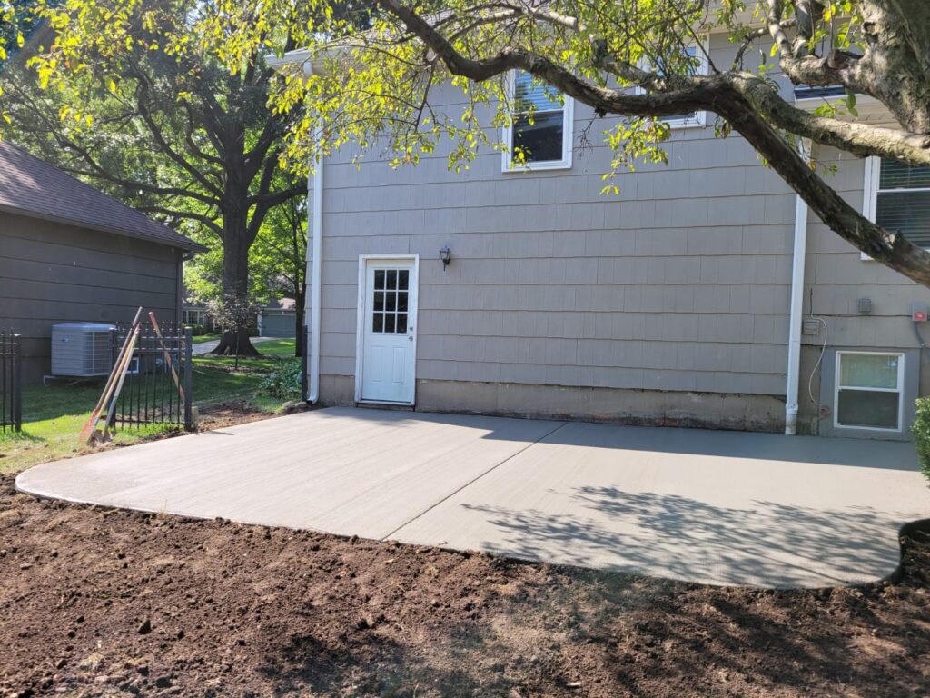 Sleek Backyard Tear Down and Replacement of Existing Patio, Kansas City, MO